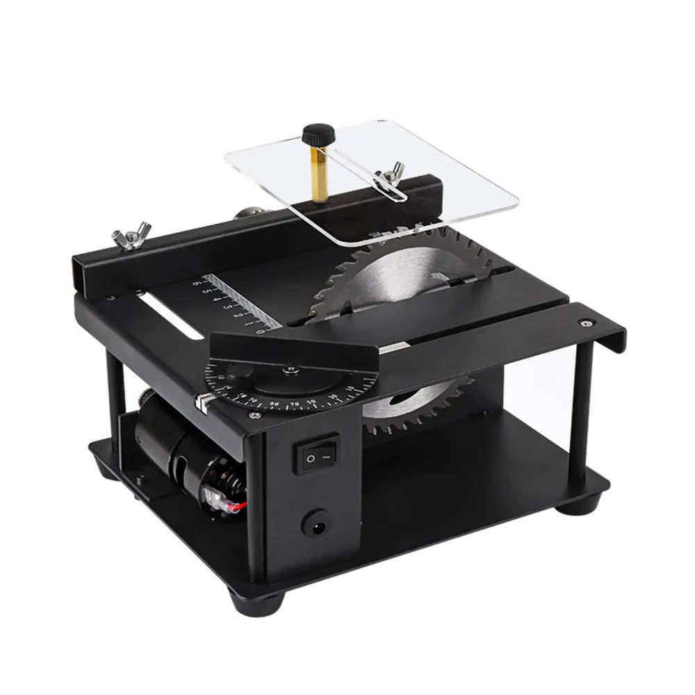Black miniature precision table saw with 110mm blade on sliding table for woodworking