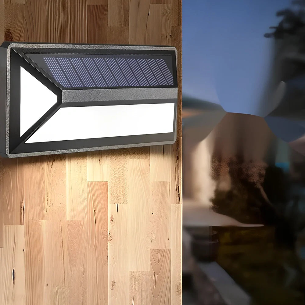 Black solar-powered wall light with 33 LED bulbs for outdoor illumination