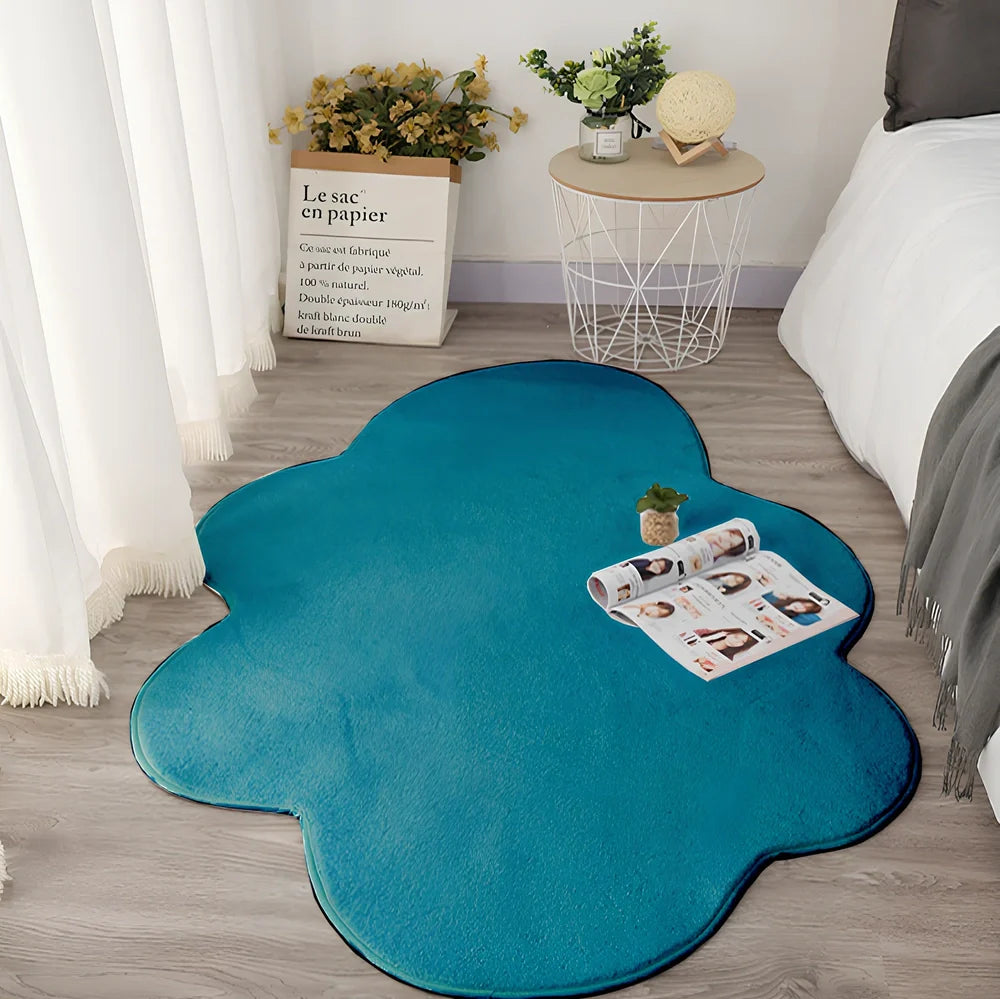 White cloud floor mat in blue colour measuring 80x120cm with plain pattern design