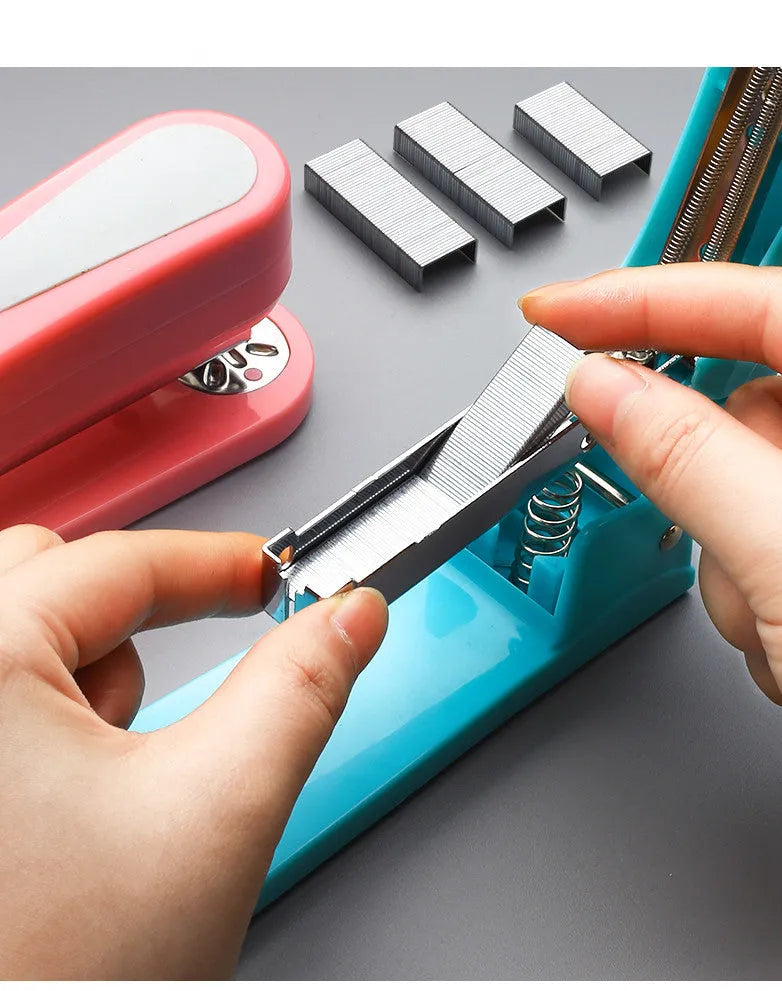 Rotatable stapler in dark blue showing 360° rotation, capable of binding 25 A4 sheets with eight direction options.