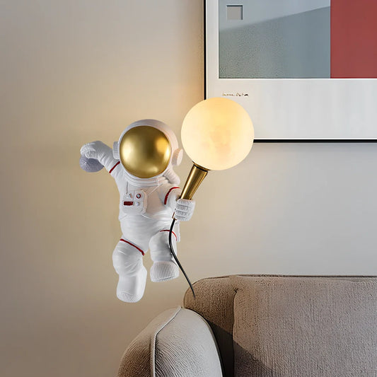 White astronaut desk lamp showing standing, seated, and wall-mounted styles with UK plug