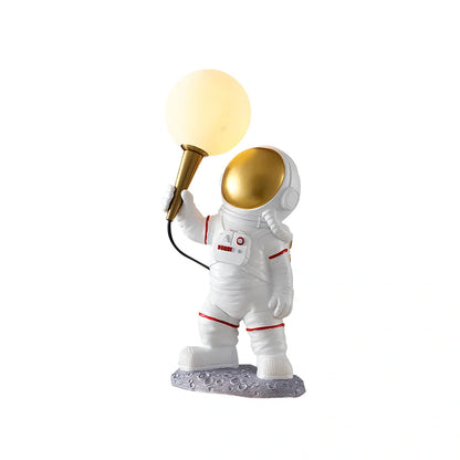 White astronaut desk lamp showing standing, seated, and wall-mounted styles with UK plug