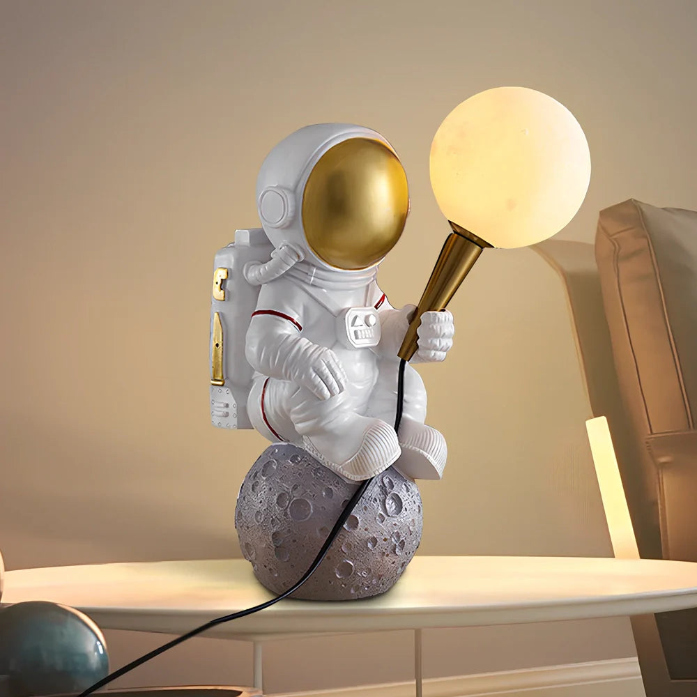 White astronaut desk lamp showing standing, seated, and wall-mounted styles with UK plug