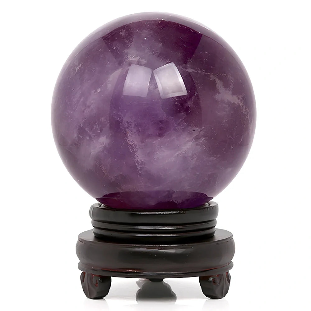 Natural purple amethyst crystal ball with polished surface in geometric sphere form