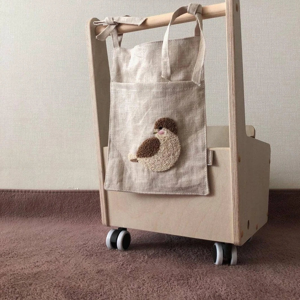 Khaki cotton linen bedside storage bag with 40x30cm pocket organiser hanging beside bed