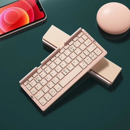 Compact foldable Bluetooth keyboard with aluminum alloy construction, hidden stand, and multi-device connectivity