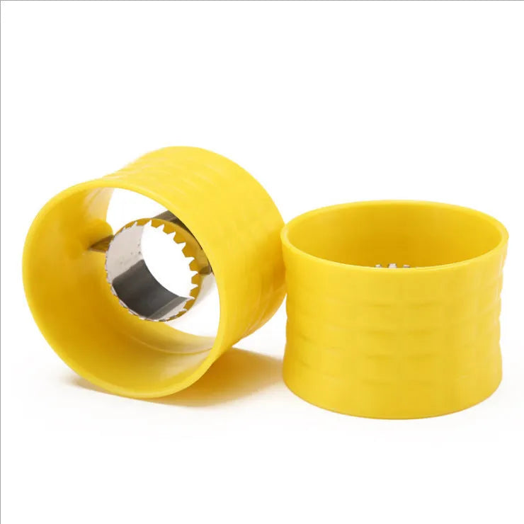Yellow manual corn grinder thresher with corn-shaped design and stainless steel gear for peeling corn kernels.