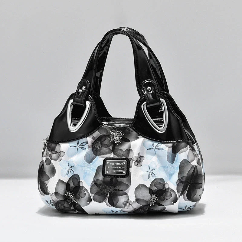 Women's multicolor PU leather handbag with floral design and multiple pockets