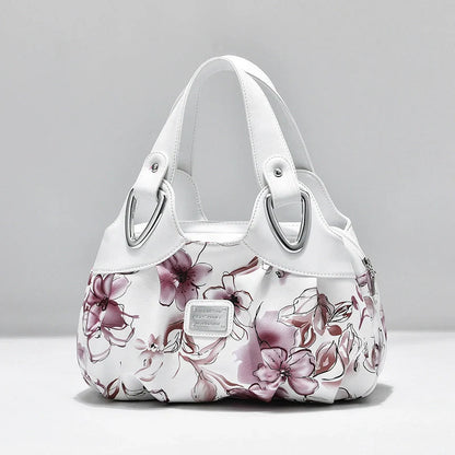 Women's multicolor PU leather handbag with floral design and multiple pockets