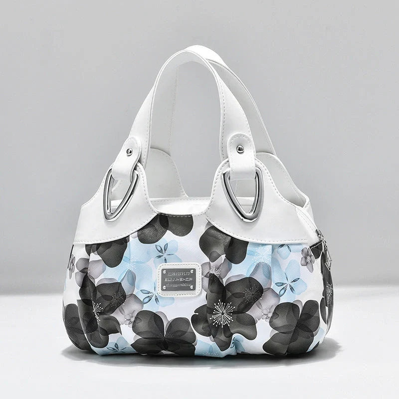 Women's multicolor PU leather handbag with floral design and multiple pockets