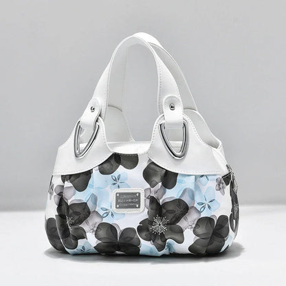 Women's multicolor PU leather handbag with floral design and multiple pockets
