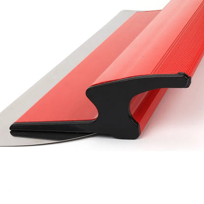 Red leveling scraper with 40cm stainless steel blade for wall preparation tasks