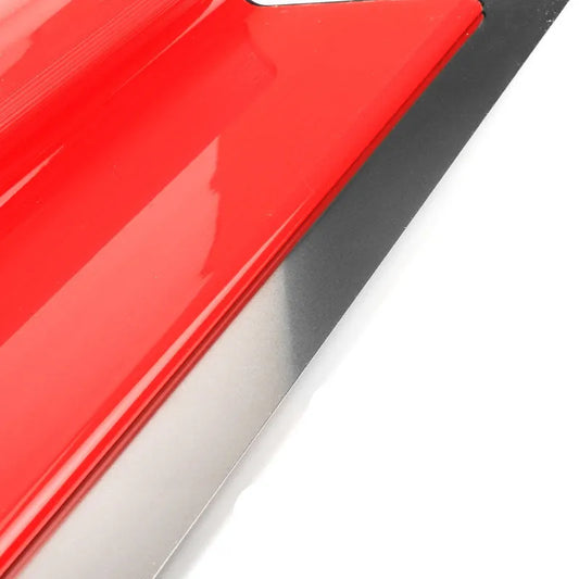 Red leveling scraper with 40cm stainless steel blade for wall preparation tasks