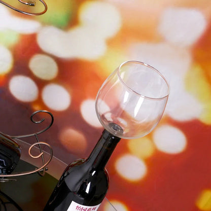 Crystal transparent glass red wine bottle drinking cup with screw-on base stopper showing 601-700ml capacity