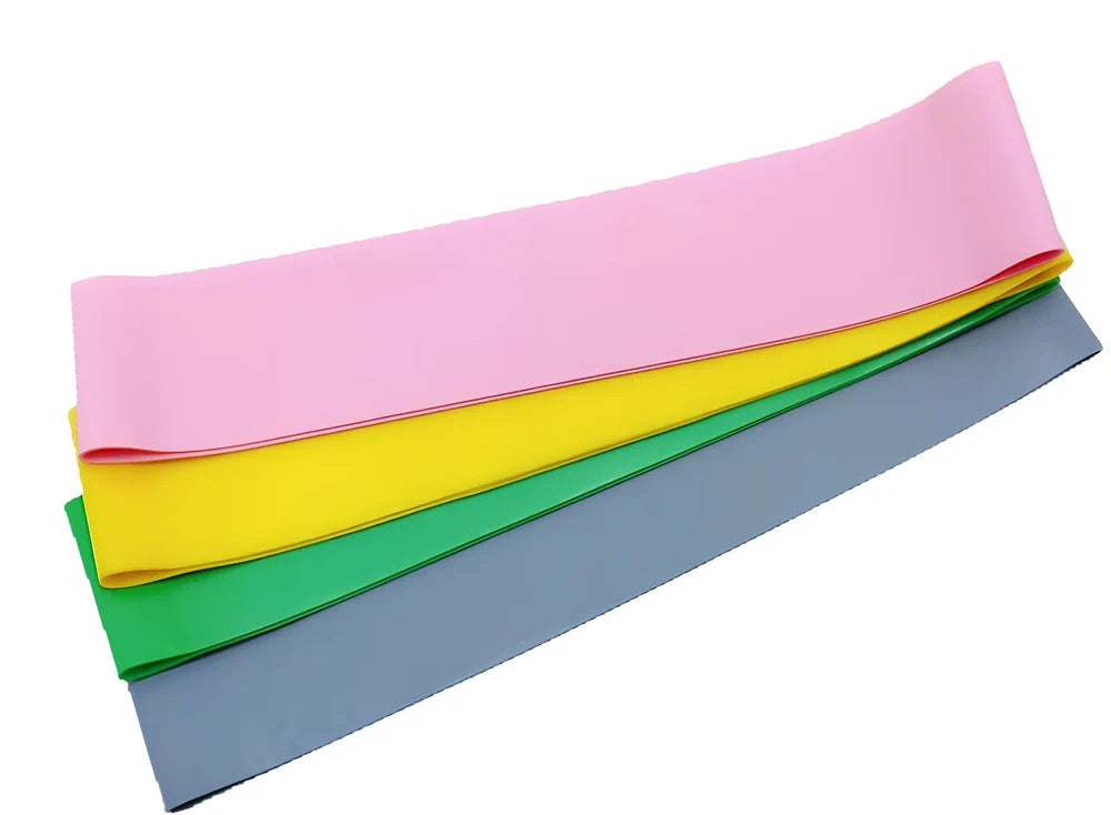 Pink latex yoga resistance band, 500mm length, 50mm width, 0.3mm thick for fitness exercises
