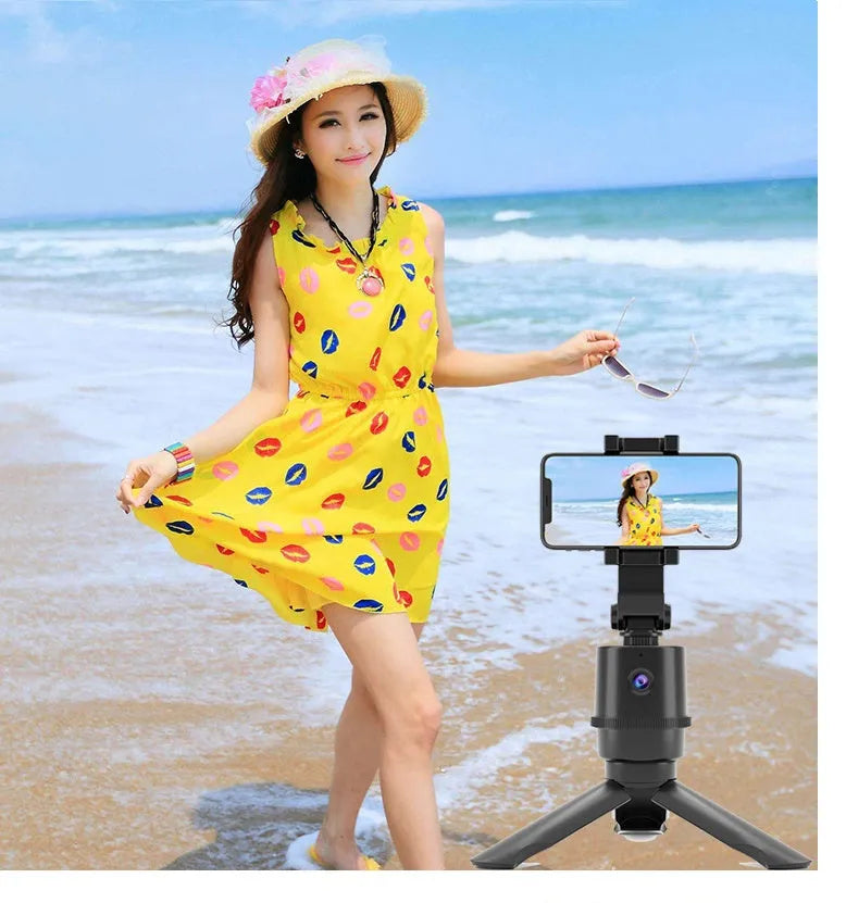 360-degree rotating AI tracking pan-tilt bracket holding a smart phone for hands-free video.