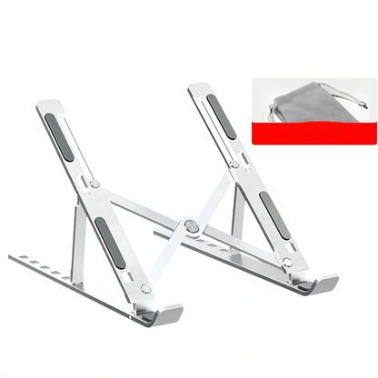 Silver aluminium alloy laptop stand folded slim, supporting 17.3-inch device with ventilation gaps and non-slip pads
