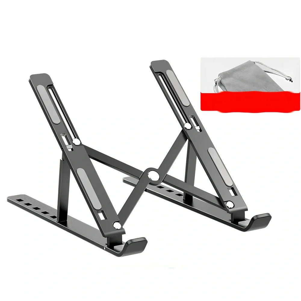Silver aluminium alloy laptop stand folded slim, supporting 17.3-inch device with ventilation gaps and non-slip pads