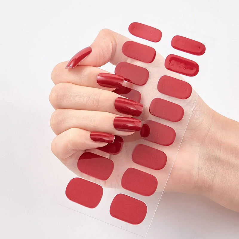 A collection of vibrant solid color nail art stickers in various designs