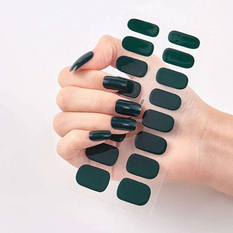 A collection of vibrant solid color nail art stickers in various designs