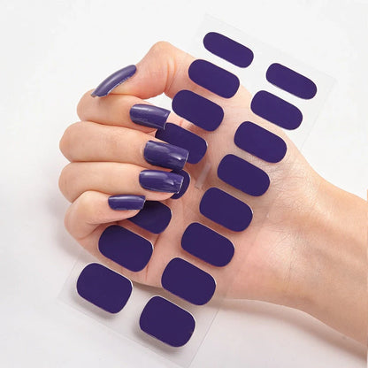A collection of vibrant solid color nail art stickers in various designs