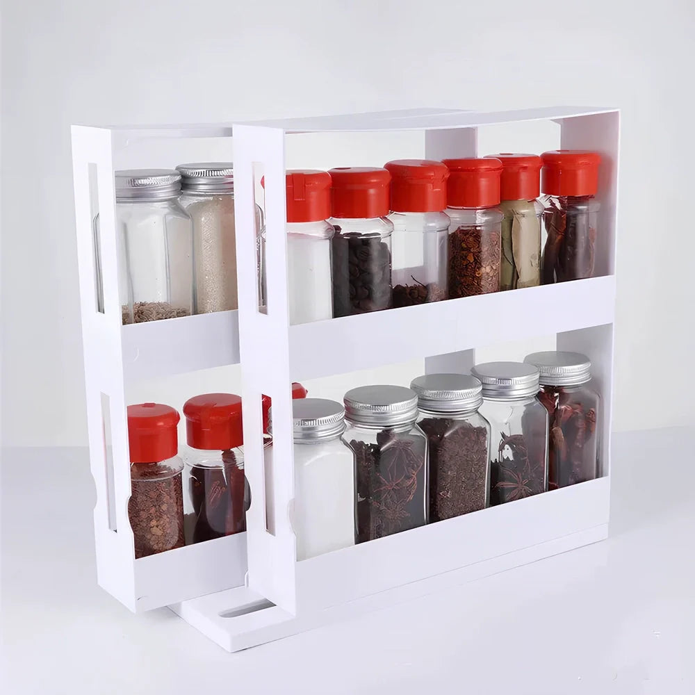 White rotating kitchen spice rack with two tiers holding multiple spice containers