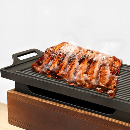 Korean baking pan set with four different sized pans in wooden storage block