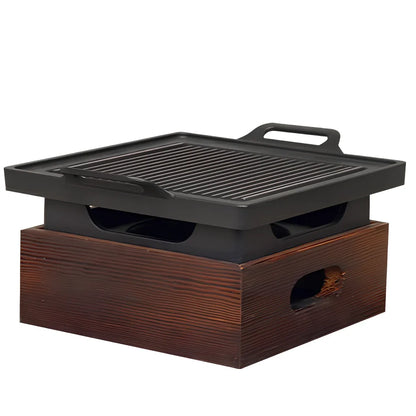 Korean baking pan set with four different sized pans in wooden storage block