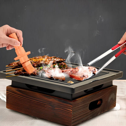 Korean baking pan set with four different sized pans in wooden storage block
