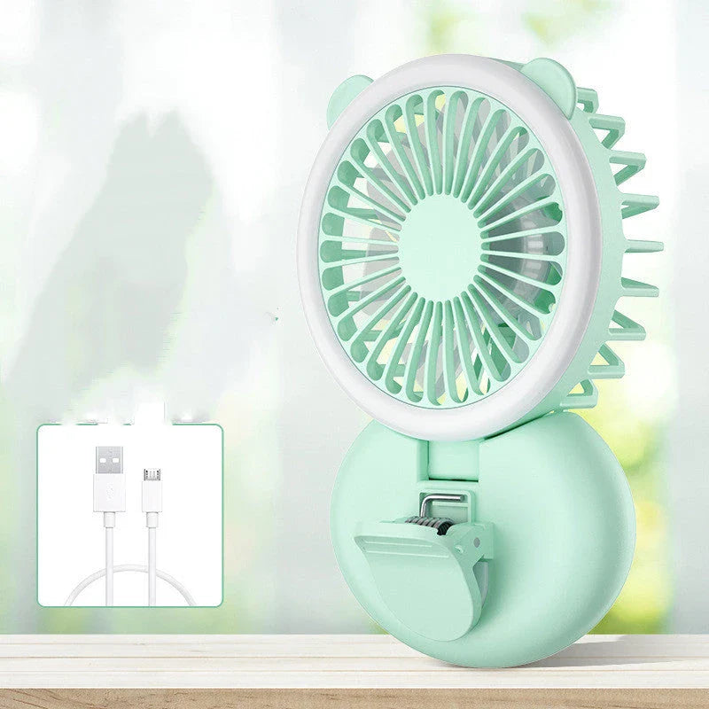Portable USB-powered mini fan with LED fill light for taking selfies and videos in low-light conditions