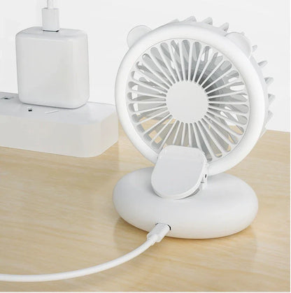 Portable USB-powered mini fan with LED fill light for taking selfies and videos in low-light conditions