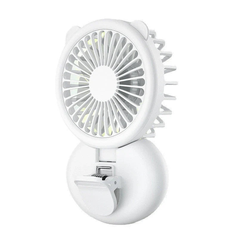 Portable USB-powered mini fan with LED fill light for taking selfies and videos in low-light conditions