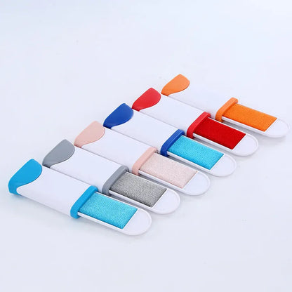 Double-sided pet brush fur comb tool with self-cleaning base, reusable and portable, in dark blue, gray, light blue, orange, and red.
