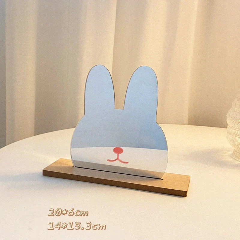 Acrylic makeup mirror with irregular edge and wooden base, available in various decorative styles