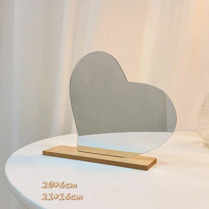 Acrylic makeup mirror with irregular edge and wooden base, available in various decorative styles