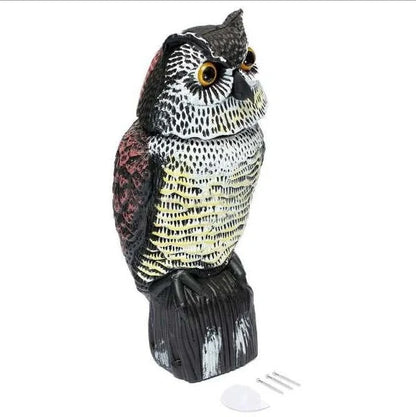 Lifelike owl decoy with 360-degree rotation for garden and farm pest control