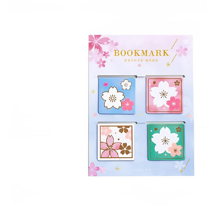 Set of four sakura-themed magnetic bookmarks showing cherry blossom designs on stone paper