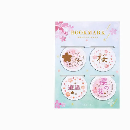 Set of four sakura-themed magnetic bookmarks showing cherry blossom designs on stone paper