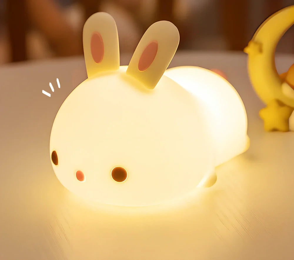 White rabbit silicone night light with touch control measuring 94x144x104mm
