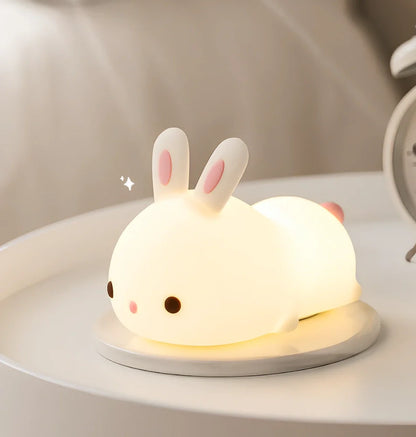 White rabbit silicone night light with touch control measuring 94x144x104mm