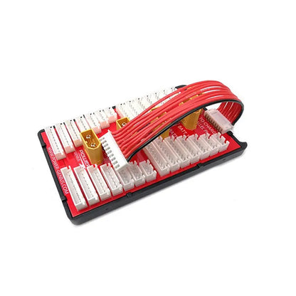 V2 parallel charge board with red PCB, gold-plated connectors, and silicone caps for charging multiple lithium batteries