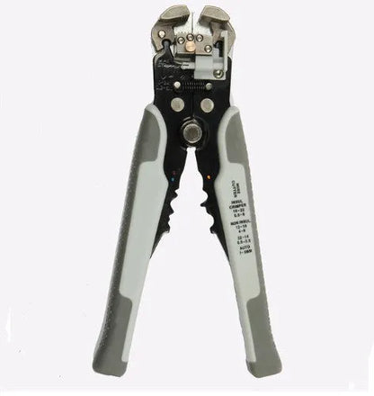Yellow automatic 3-in-1 wire stripper and crimping plier tool on a workbench