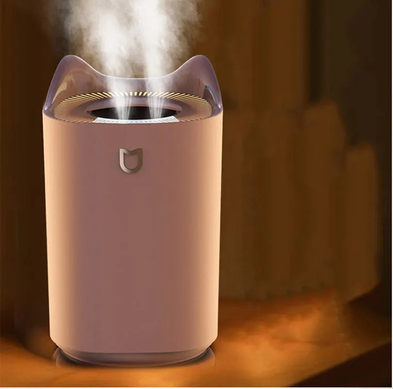 Double spray humidifier in Coral Pink or Glacier White with USB cable and three mist outlets