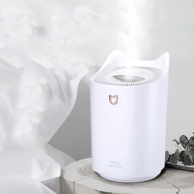 Double spray humidifier in Coral Pink or Glacier White with USB cable and three mist outlets