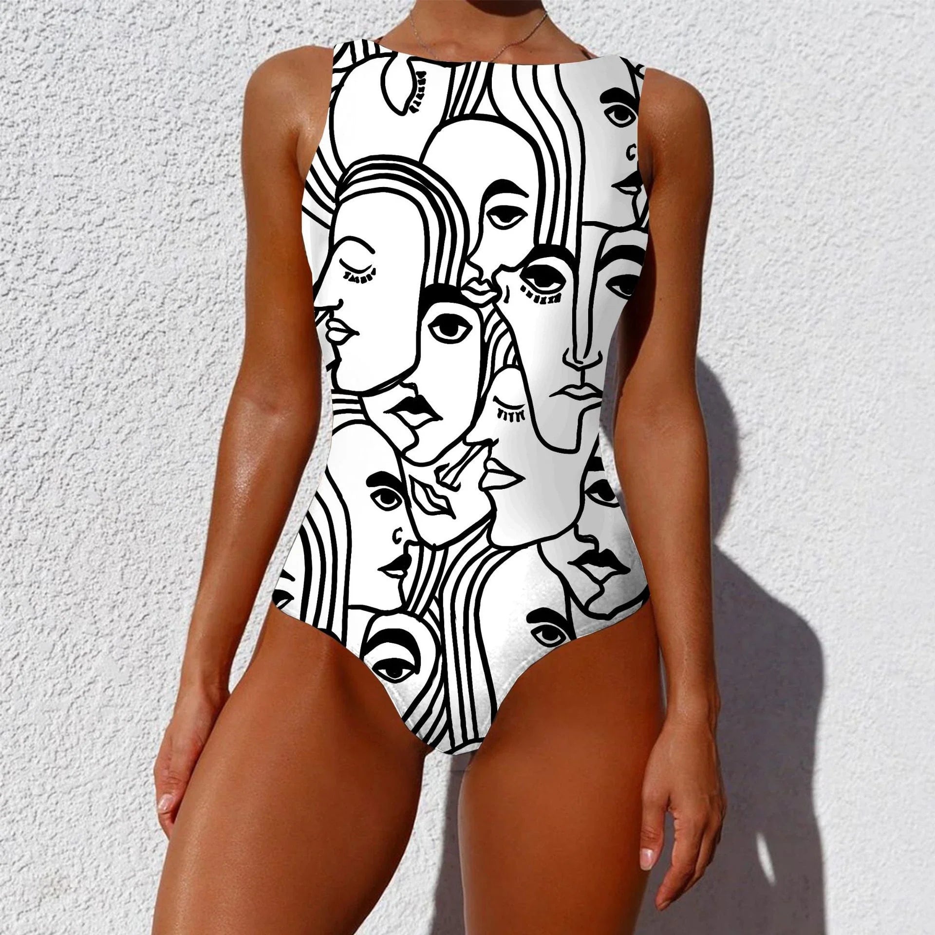 Stylish one-piece swimsuit featuring a bold, vintage-inspired abstract print in a variety of vibrant color options