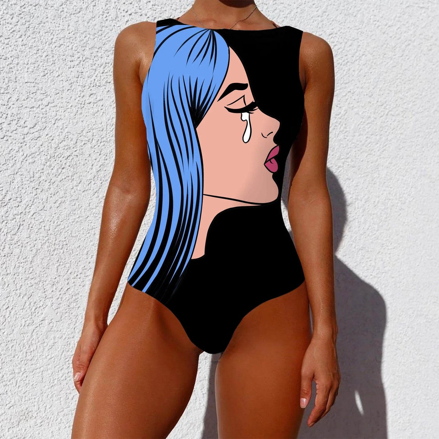 Stylish one-piece swimsuit featuring a bold, vintage-inspired abstract print in a variety of vibrant color options