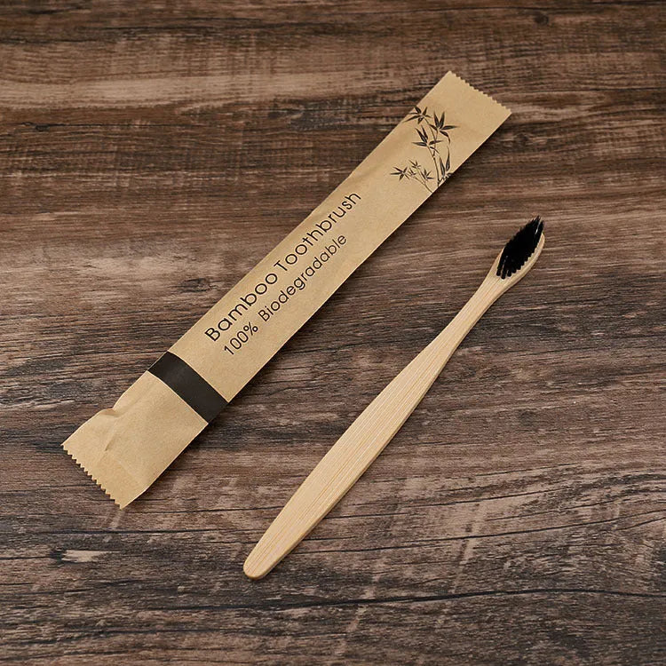 10 bamboo toothbrushes with charcoal bristles in multiple colours including green, purple, yellow, white, grey and black