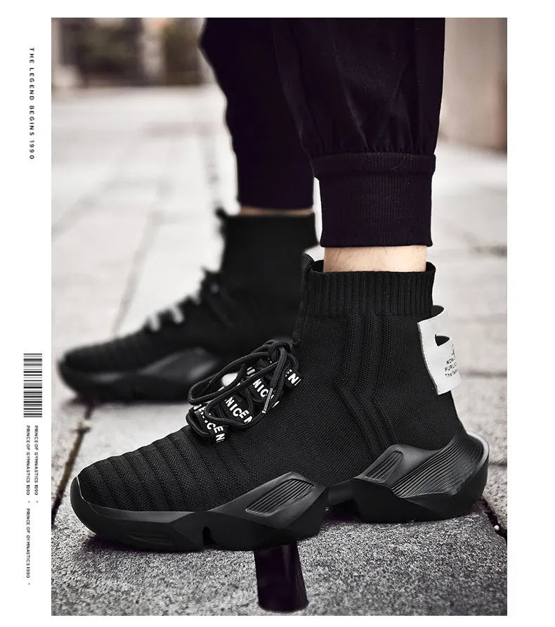 Men's black and white socks-style casual sports shoes with mesh lining, shown in large sizes.