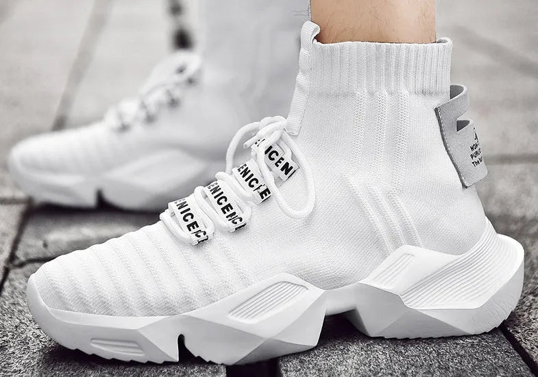Men's black and white socks-style casual sports shoes with mesh lining, shown in large sizes.
