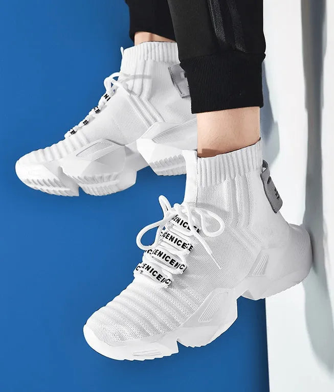 Men's black and white socks-style casual sports shoes with mesh lining, shown in large sizes.